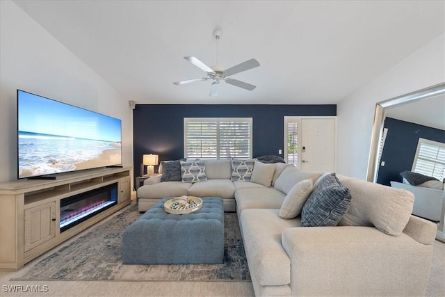 living room with lofted ceiling and ceiling fan