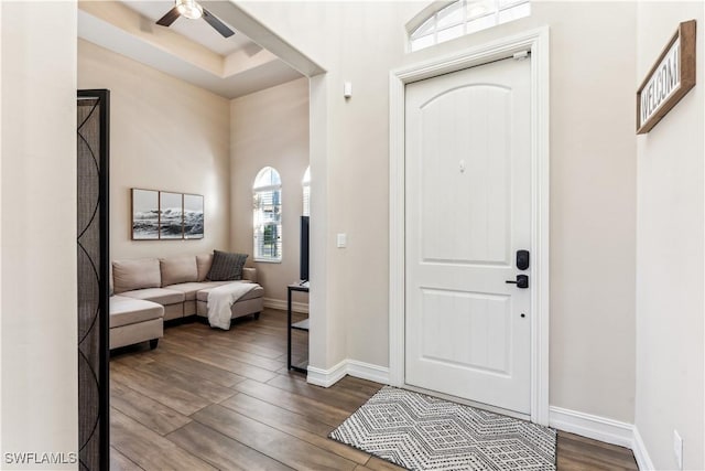7821 Ashton Rd, Naples, FL 34113 - foyer featuring dark wood-type flooring and ceiling fan