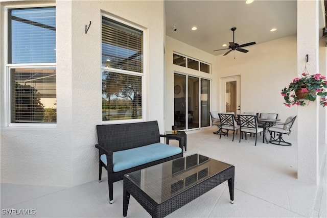 7821 Ashton Rd, Naples, FL 34113 - view of patio with a ceiling fan and outdoor dining area
