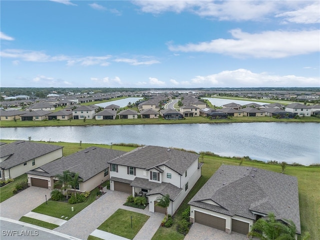 drone / aerial view featuring a water view