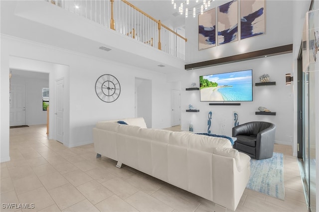 tiled living room with a high ceiling