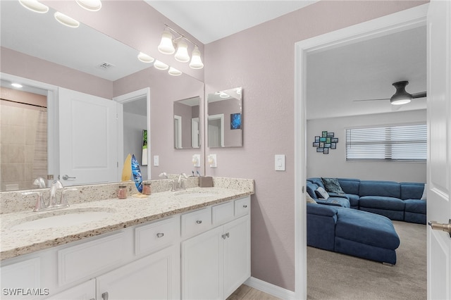 bathroom with vanity and ceiling fan