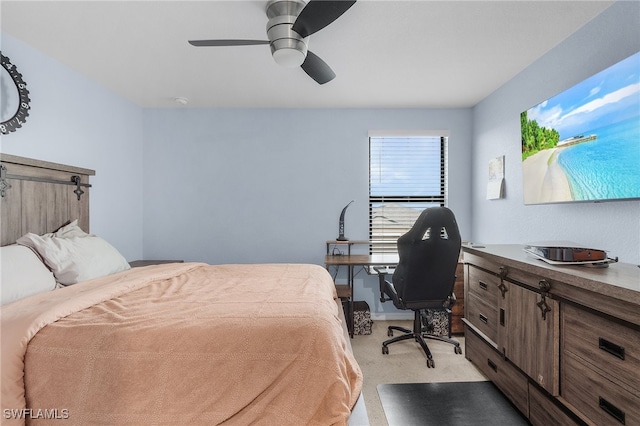 bedroom with light colored carpet and ceiling fan