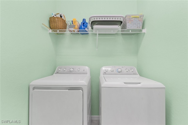 laundry area with washer and clothes dryer