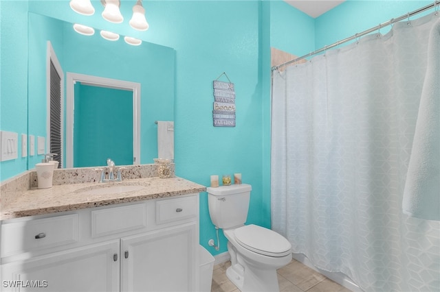 bathroom with toilet, vanity, a shower with shower curtain, and tile patterned flooring