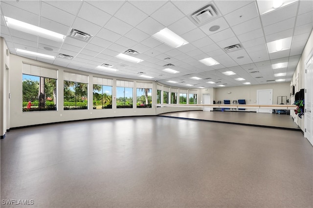 interior space featuring a drop ceiling