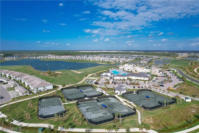 bird's eye view featuring a residential view and a water view