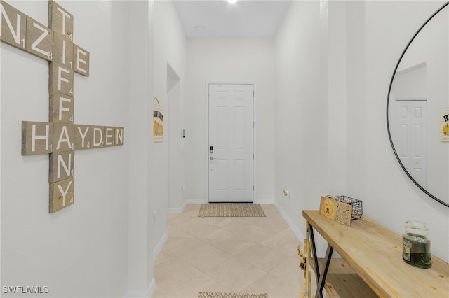 interior space featuring light tile patterned flooring