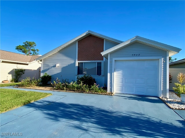 single story home with a garage