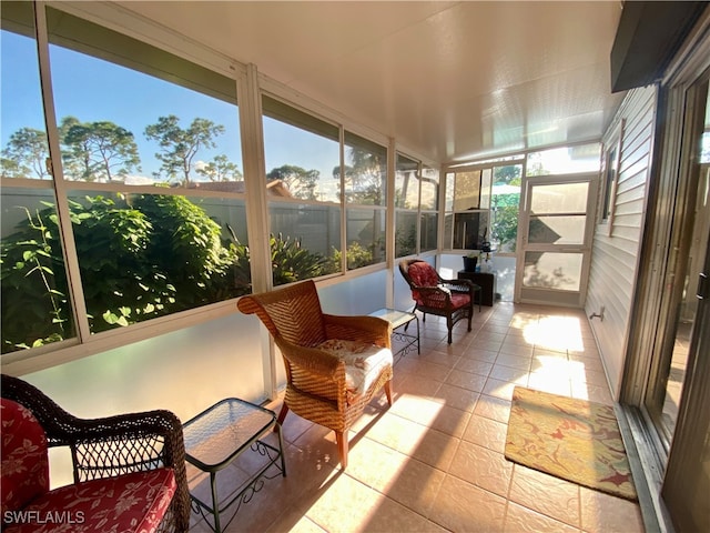 sunroom / solarium featuring plenty of natural light