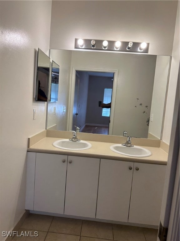 bathroom with vanity and tile patterned flooring