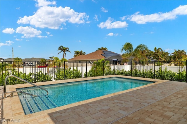 view of pool with a fenced in pool, a patio area, and fence