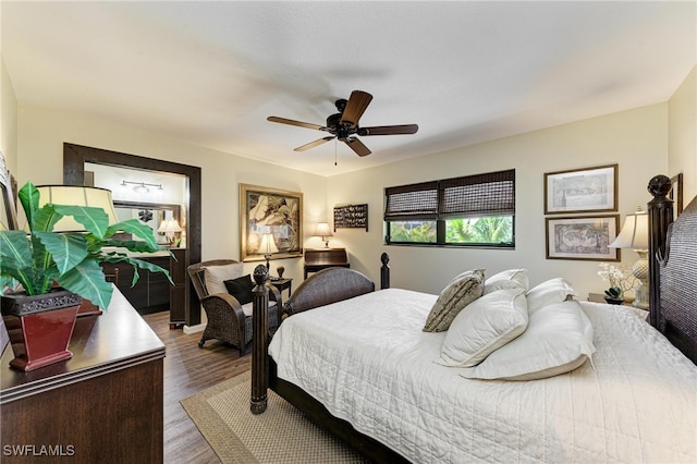 bedroom featuring ceiling fan and hardwood / wood-style floors