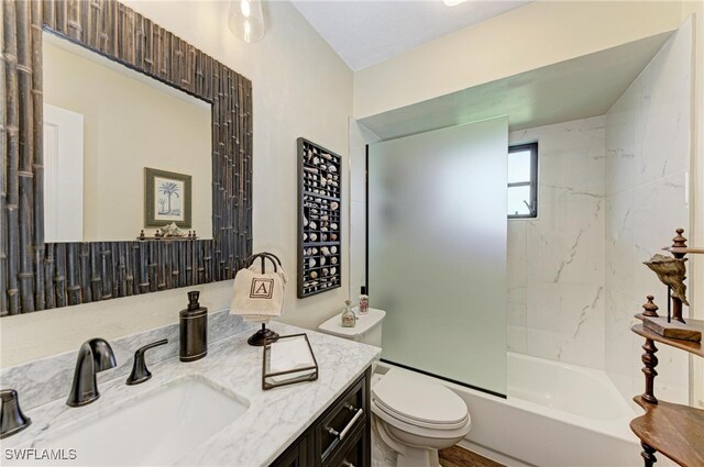 full bathroom with vanity, toilet, and tiled shower / bath combo