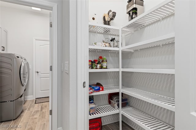 pantry featuring washer / dryer