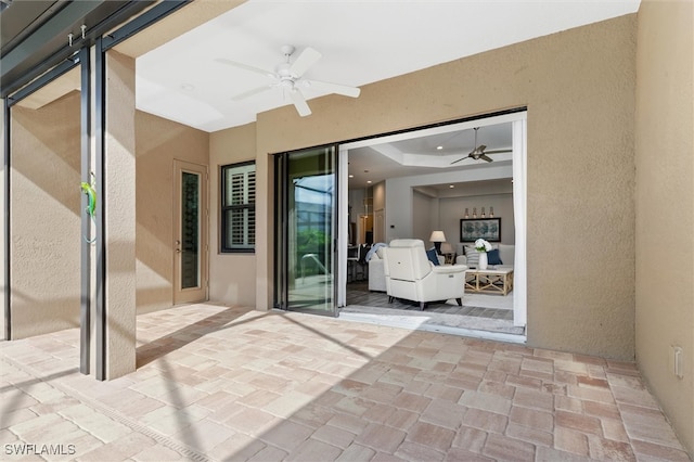 view of patio with ceiling fan