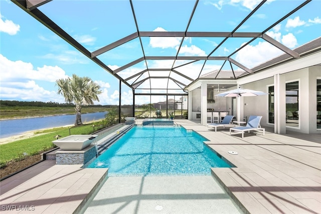 view of swimming pool with a jacuzzi, a water view, glass enclosure, and a patio