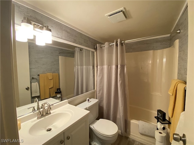 full bathroom with toilet, shower / bathtub combination with curtain, and vanity