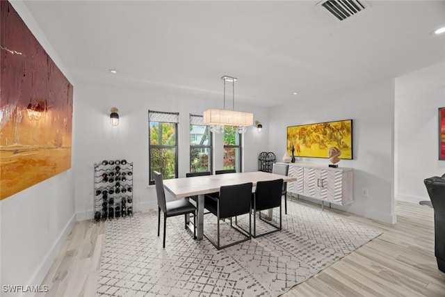 dining area with light wood-type flooring