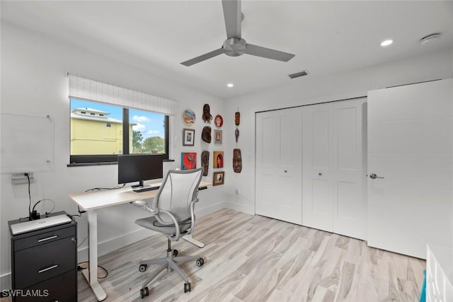 home office featuring ceiling fan and light wood-type flooring