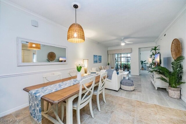 dining room with ceiling fan, light hardwood / wood-style flooring, and ornamental molding