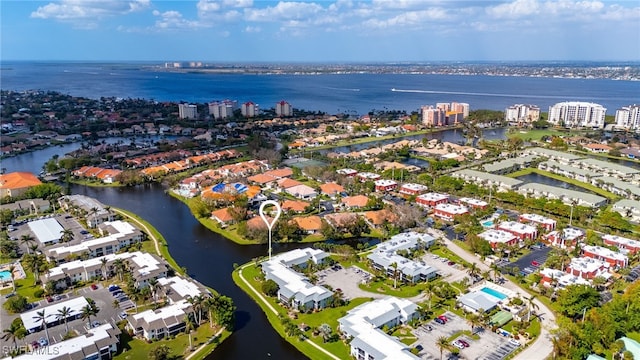 birds eye view of property featuring a water view