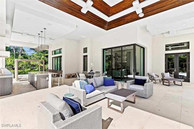 view of patio / terrace featuring outdoor lounge area and french doors