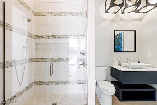 607 Myrtle Rd, Naples, FL 34108 - full bathroom featuring toilet, a shower stall, and vanity