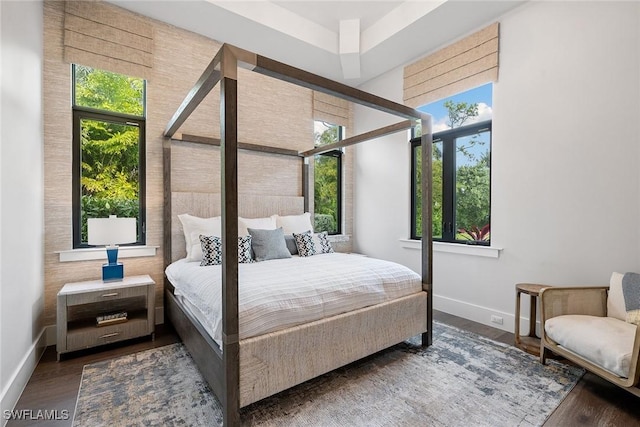 607 Myrtle Rd, Naples, FL 34108 - bedroom featuring multiple windows, baseboards, and wood finished floors
