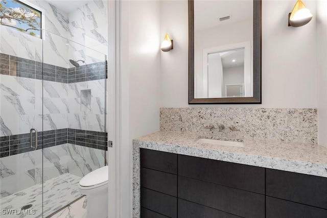 607 Myrtle Rd, Naples, FL 34108 - bathroom with vanity, a marble finish shower, and toilet