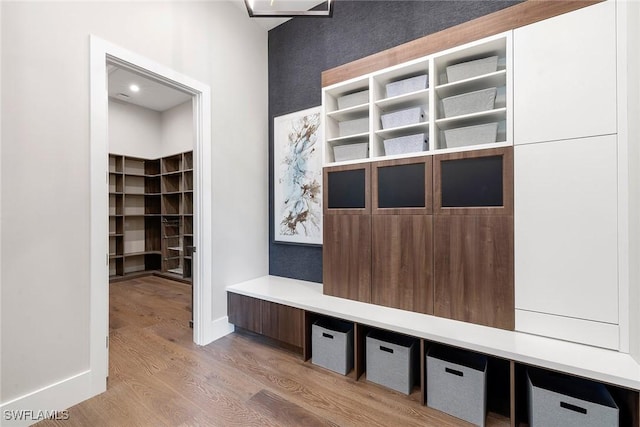 607 Myrtle Rd, Naples, FL 34108 - mudroom featuring wood finished floors and baseboards