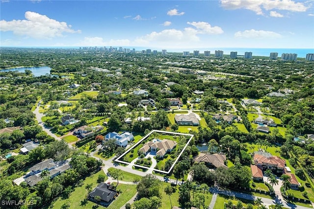607 Myrtle Rd, Naples, FL 34108 - aerial view of property's location with property boundaries highlighted, city skyline, and a large body of water