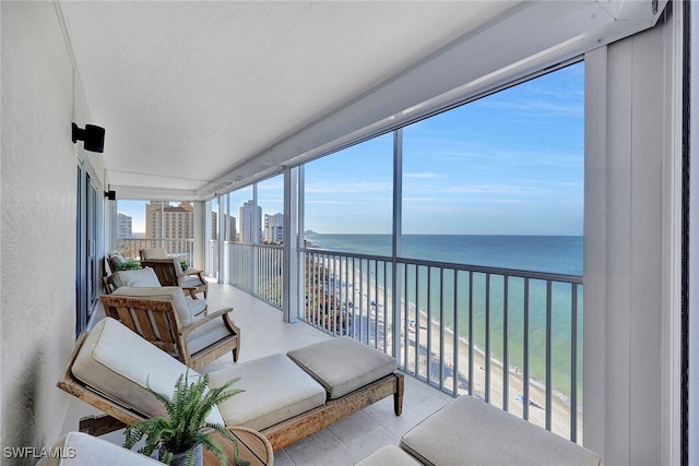 sunroom with a water view