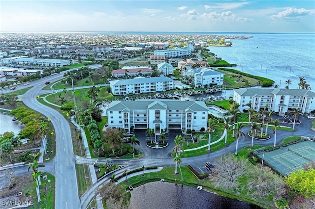 bird's eye view with a water view