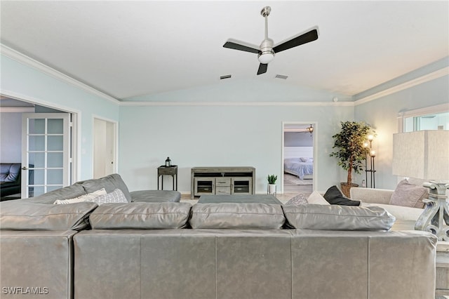 living room featuring ornamental molding, vaulted ceiling, and ceiling fan