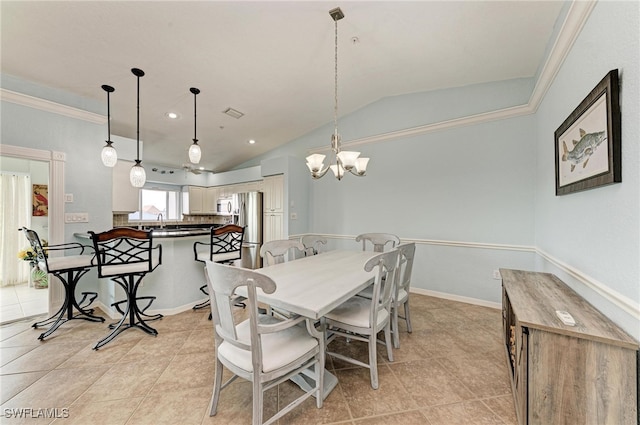 dining area featuring ornamental molding, vaulted ceiling, an inviting chandelier, and light tile patterned flooring