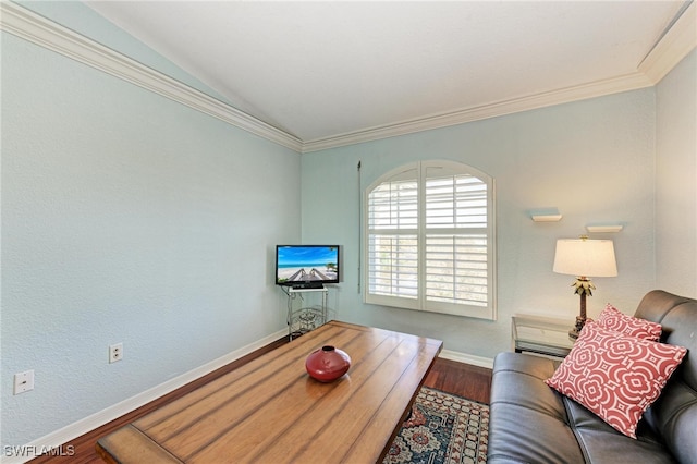 living room with ornamental molding and hardwood / wood-style flooring