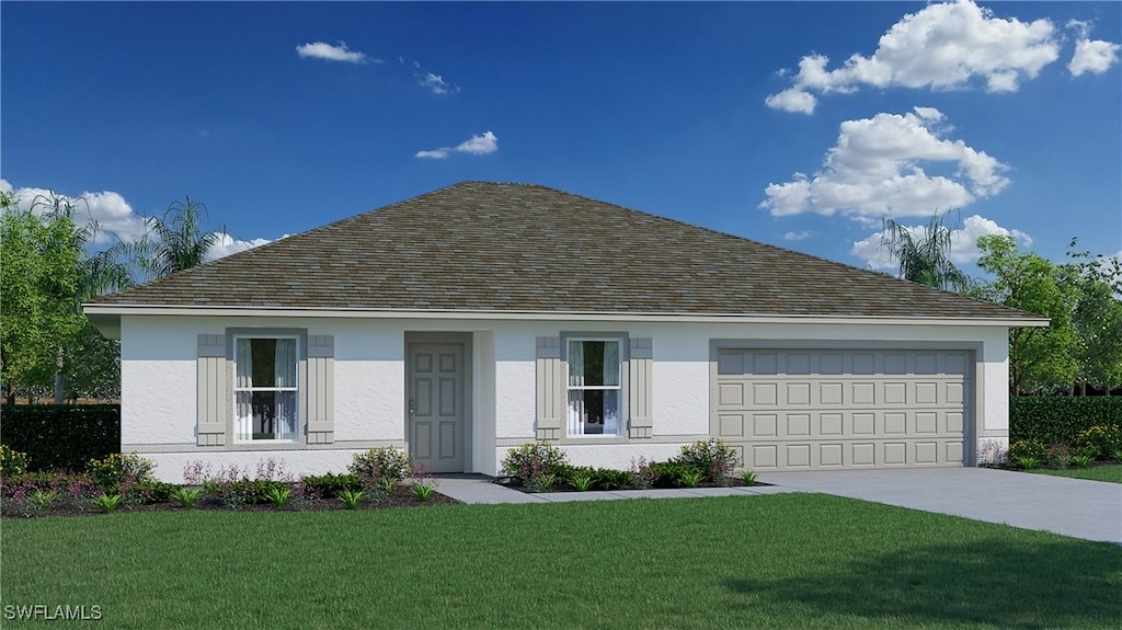 view of front of property with a garage and a front lawn