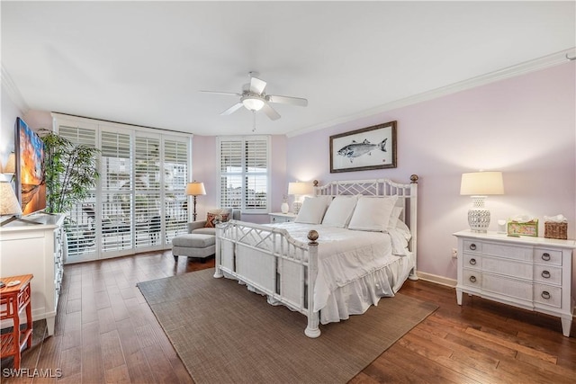 bedroom with crown molding, floor to ceiling windows, access to exterior, and dark hardwood / wood-style flooring