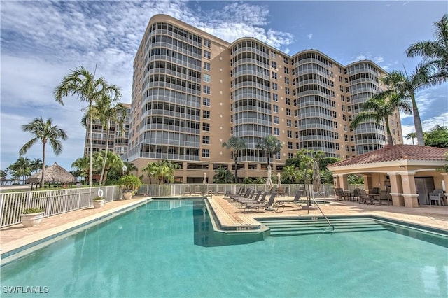 view of swimming pool with a gazebo and a patio area