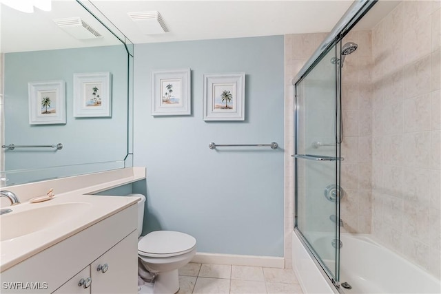 full bathroom with toilet, tile patterned floors, bath / shower combo with glass door, and vanity