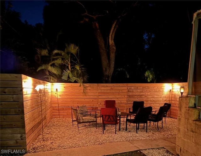 view of patio at night