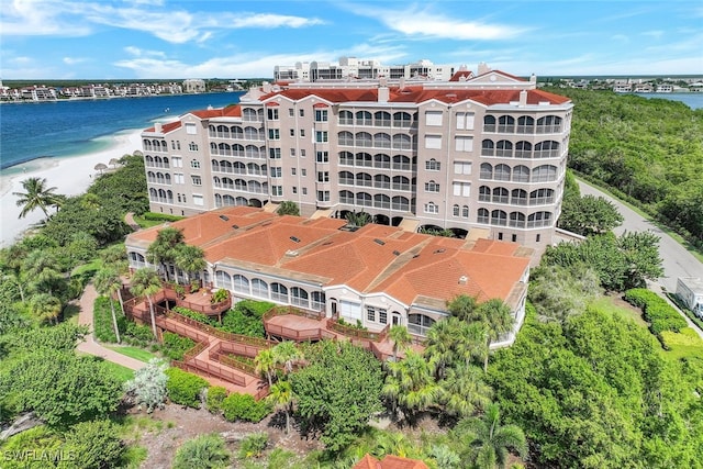 bird's eye view featuring a beach view and a water view