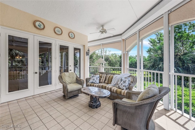 sunroom with french doors and ceiling fan