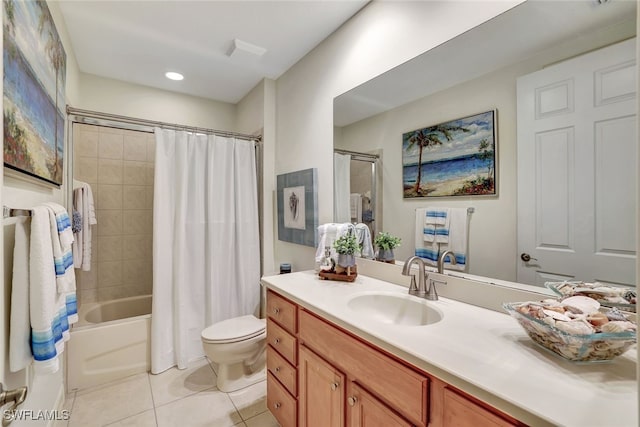 full bathroom featuring toilet, vanity, shower / bath combo with shower curtain, and tile patterned floors