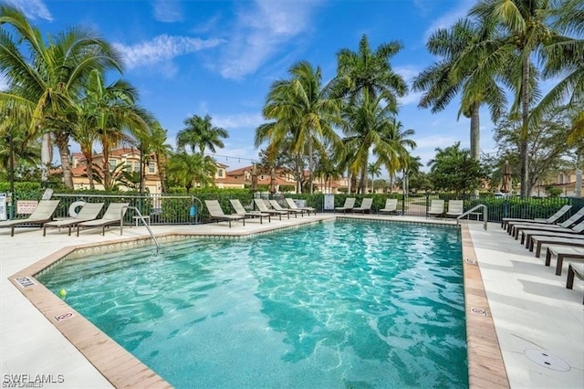 view of swimming pool featuring a patio