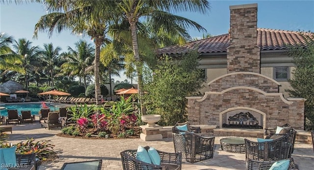 view of patio featuring a community pool