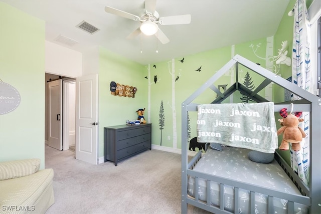 bedroom featuring ceiling fan and carpet flooring