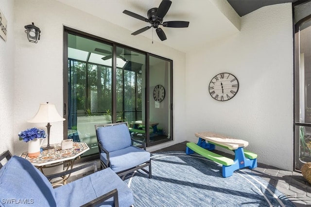 view of patio / terrace featuring ceiling fan