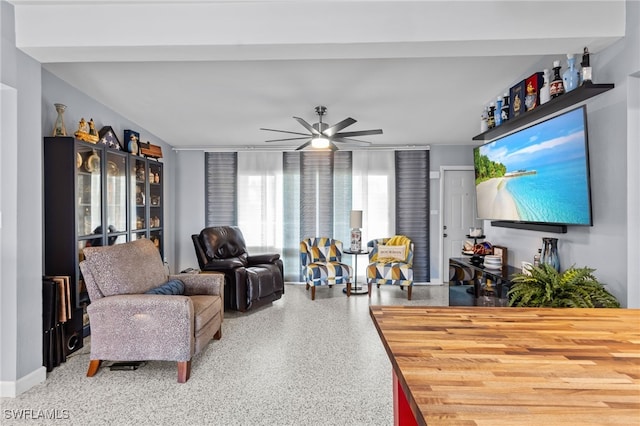 living room with ceiling fan